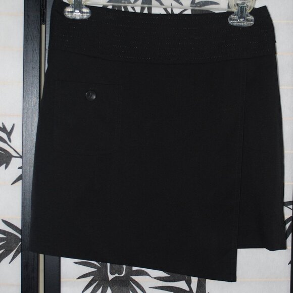 🌟 Elevate Your Wardrobe with a Classic Black bebe Mini Skirt! 🌟 - Picture 1 of 10